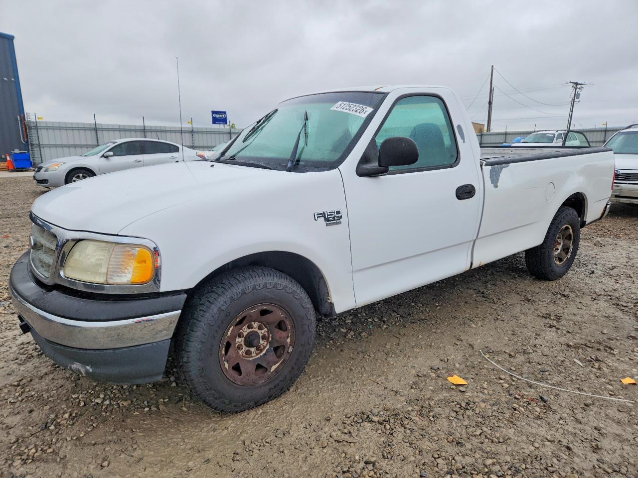 2001 Ford F150 VIN 1FTPF17M01KB25596 photo 1