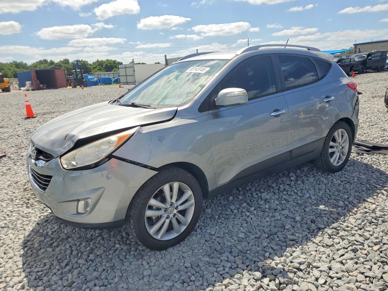 2010 Hyundai Tucson VIN KM8JU3AC5AU079822 photo 1