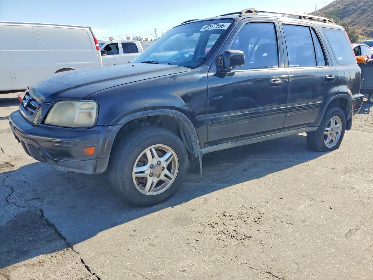 2001 Honda Crv VIN JHLRD18681C034376 photo 1