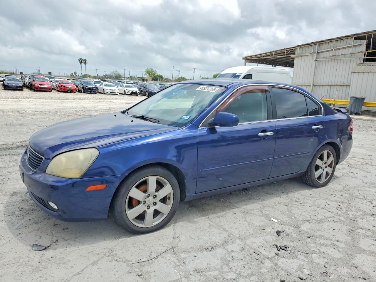 2007 Kia Optima VIN KNAGE124375126093 photo 1