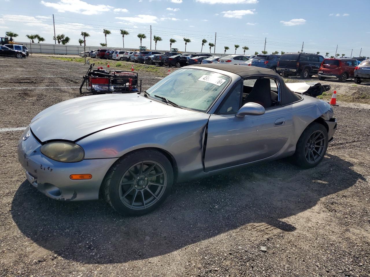 2004 Mazda Mx5 VIN JM1NB354X40409772 photo 1