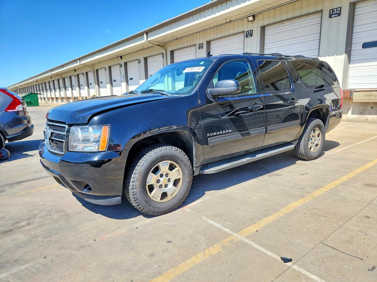 2011 Chevrolet Suburban VIN 1GNSKJE39BR387326 photo 1