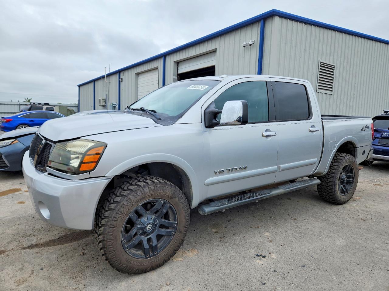 2010 Nissan TITAN VIN 1N6BA0EC6AN319431 photo 1