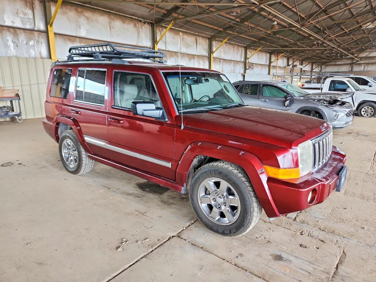 2007 Jeep Commander VIN 1J8HG58207C530195 photo 4
