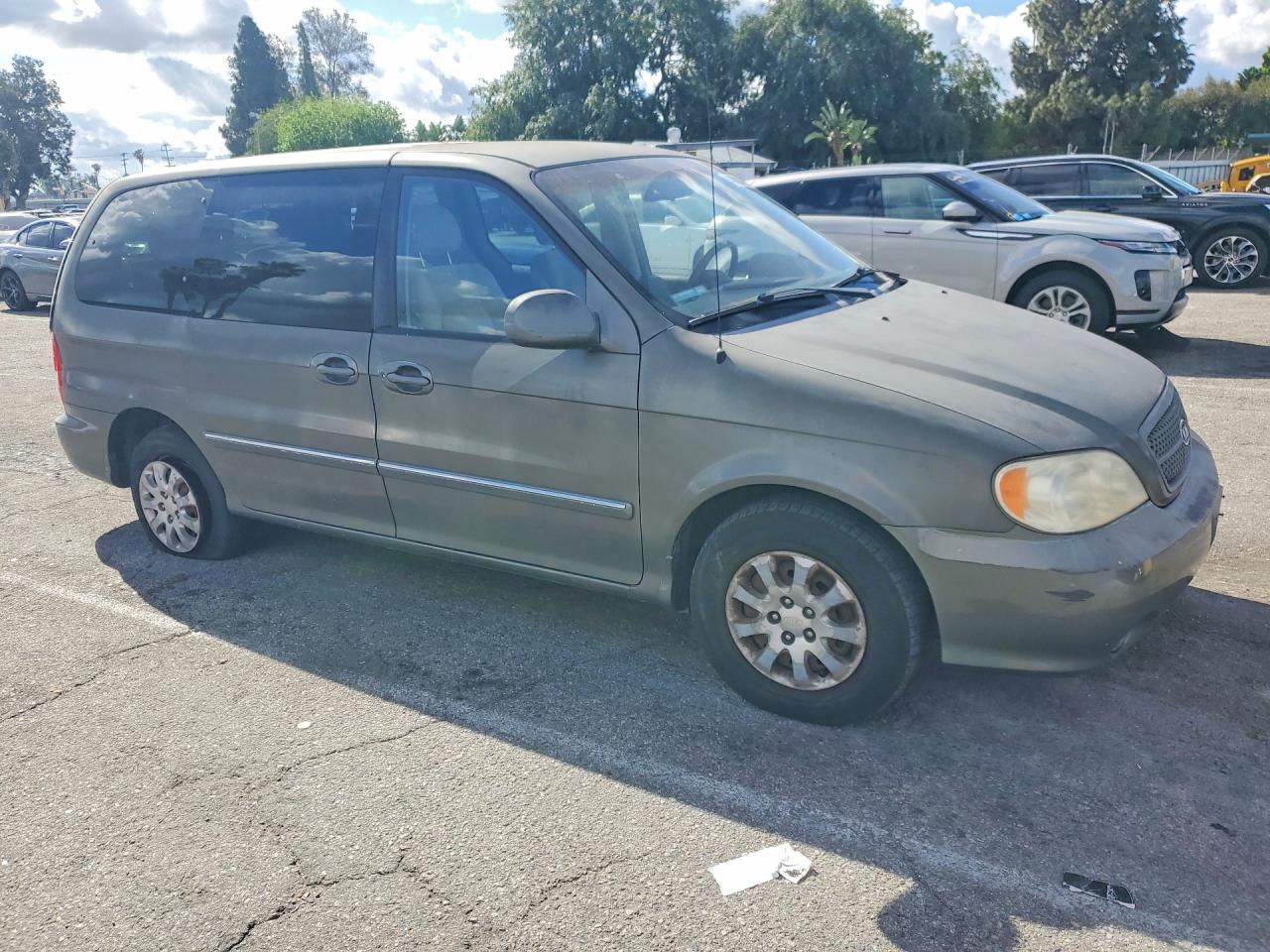 2004 Kia SEDONA VIN KNDUP131946582223 photo 4