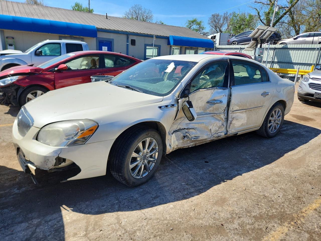 2009 Buick Lucerne VIN 1G4HD57M69U100831 photo 1