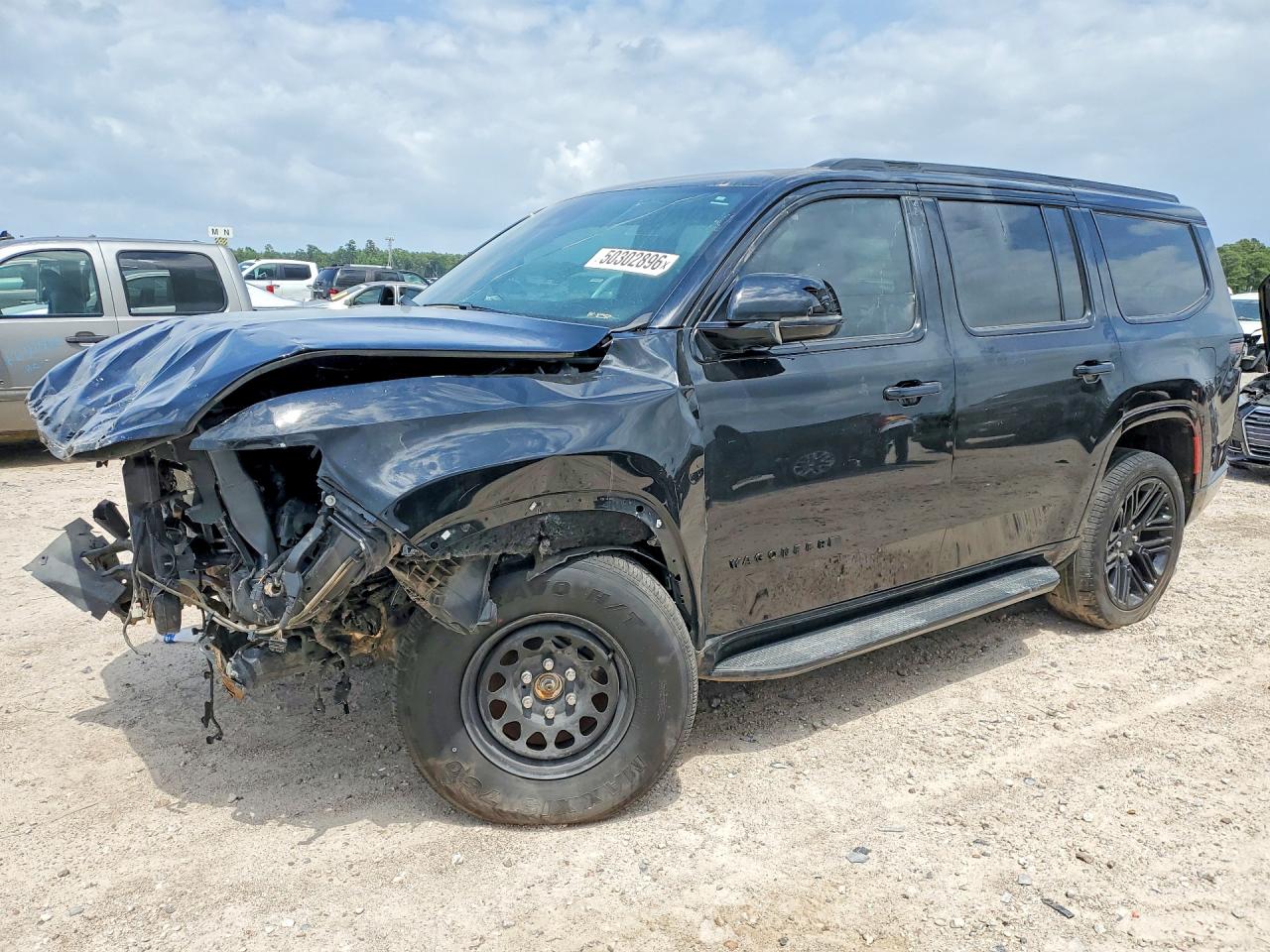 2023 Jeep Wagoneer VIN 1C4SJVBP0PS560452 photo 1