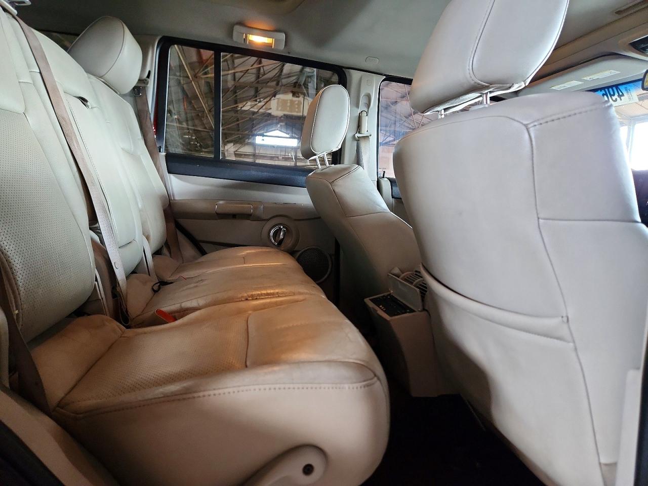 2007 Jeep Commander VIN 1J8HG58207C530195 photo 11