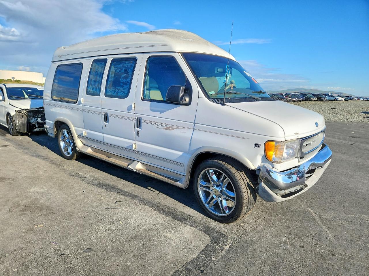 2002 Ford Econoline VIN 1FDRE14LX2HB76637 photo 4