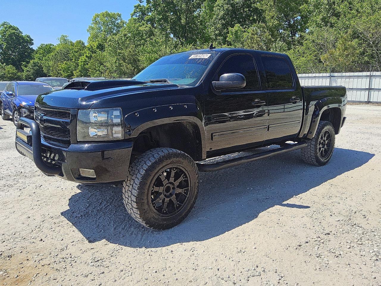 2013 Chevrolet Silverado VIN 3GCPKSE2XDG234520 photo 1