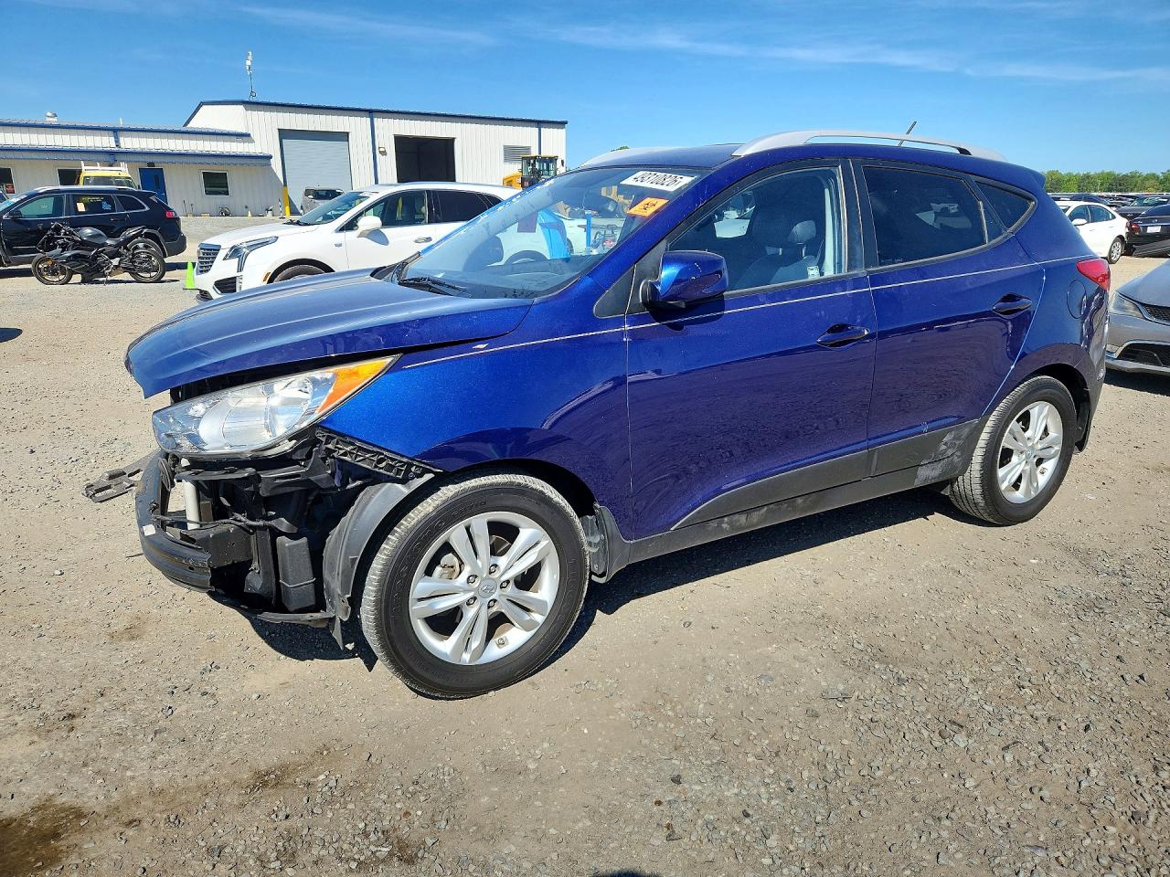 2011 Hyundai Tucson VIN KM8JU3AC6BU207857 photo 1
