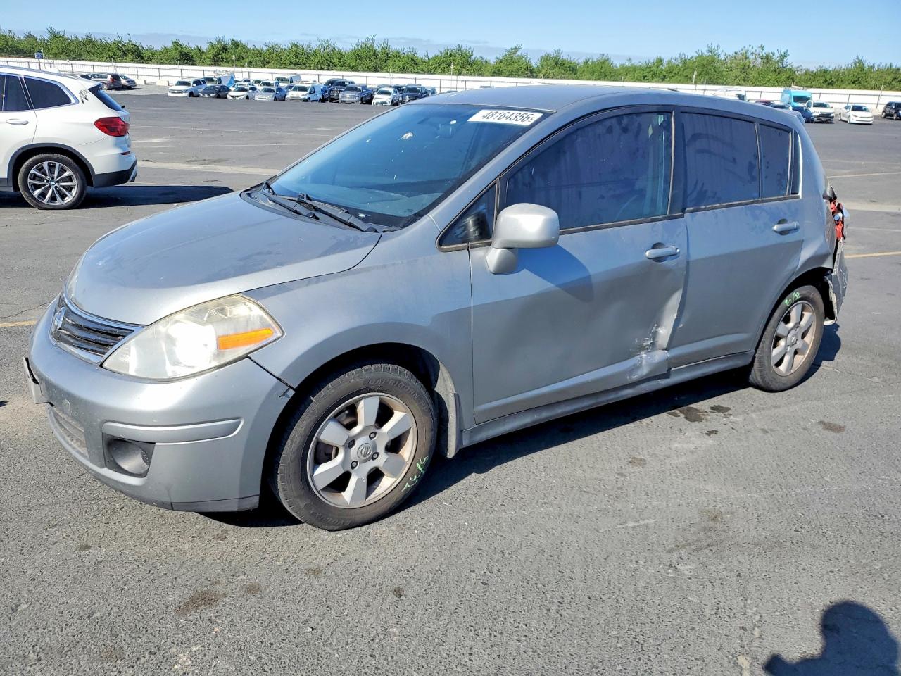 2012 NISS Versa VIN 3N1BC1CP1CK198165 photo 1