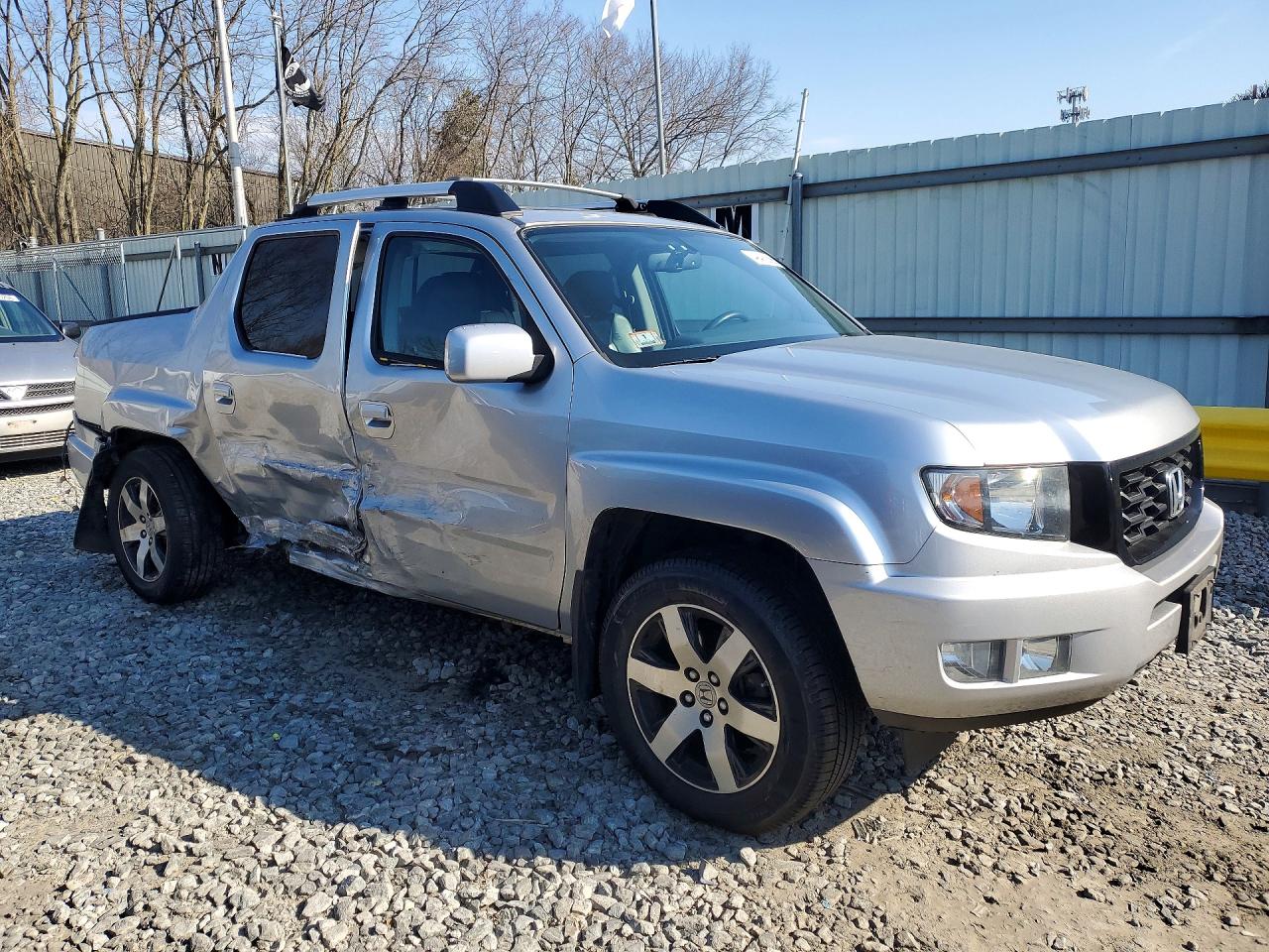 2014 Honda Ridgeline VIN 5FPYK1F64EB014501 photo 4