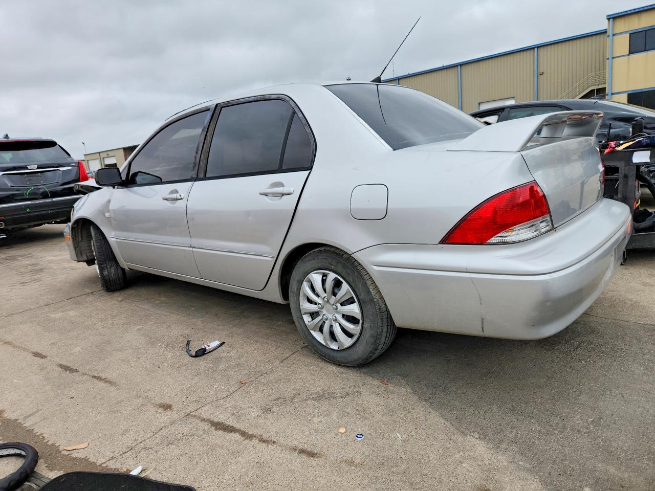 2002 Mitsubishi Lancer VIN JA3AJ26E02U016905 photo 2