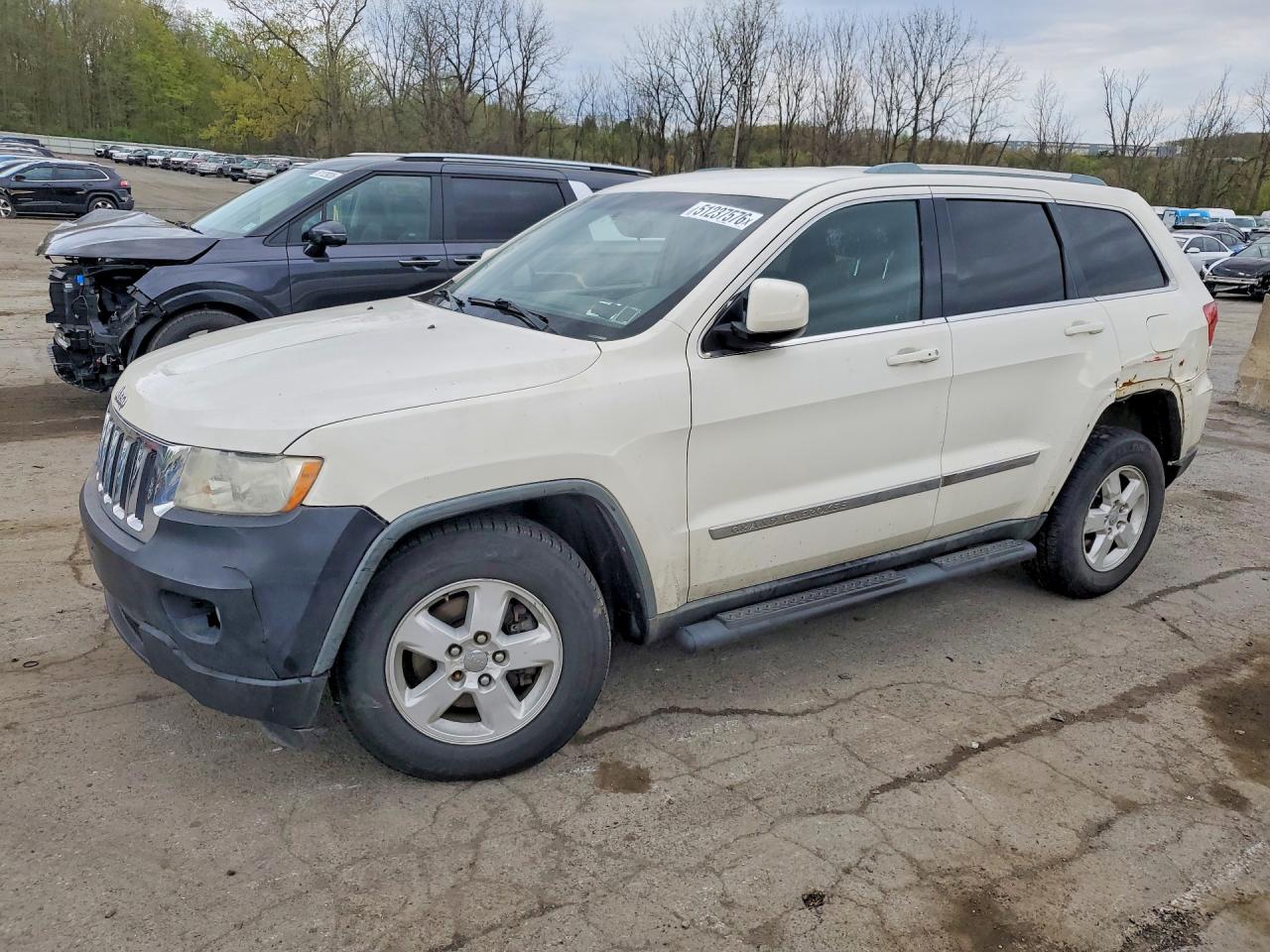 2011 JEEP Cherokee VIN 1J4RR4GG5BC614951 photo 1