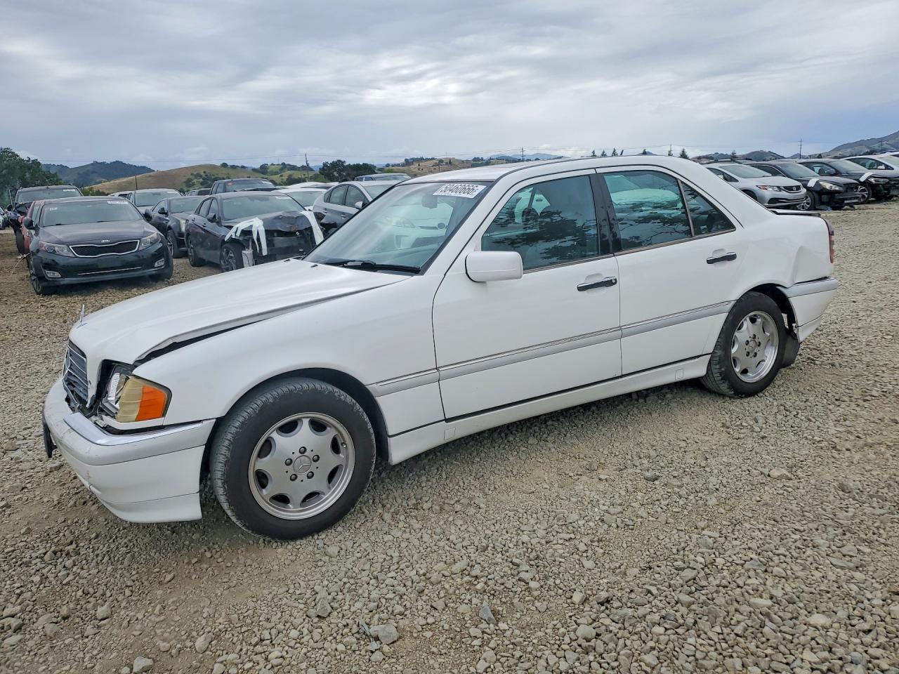 2000 MERZ C230kmp/sp VIN WDBHA24G9YA837675 photo 1
