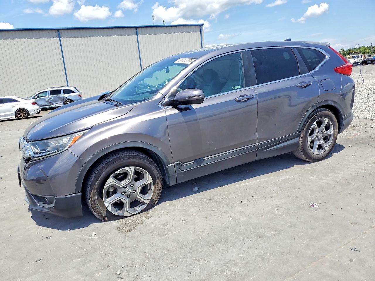 2018 Honda Crv VIN 5J6RW1H51JA007752 photo 1