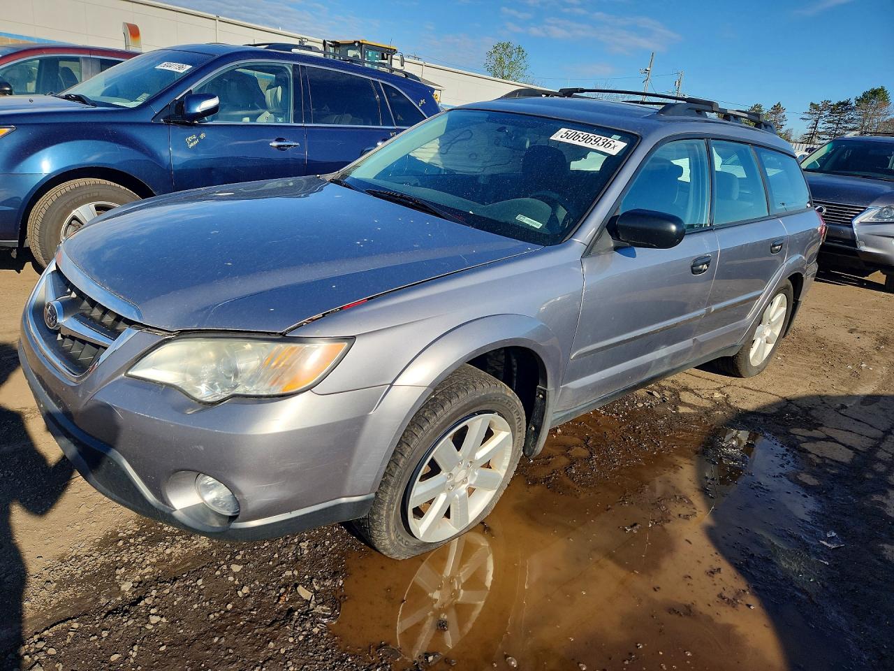 2009 Subaru Outback VIN 4S4BP61C697339099 photo 1