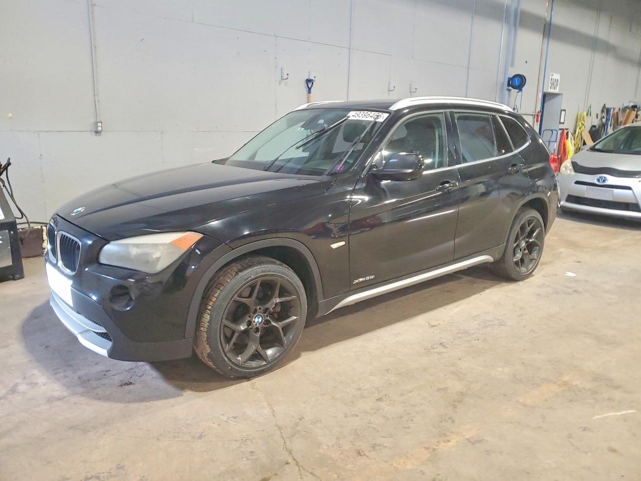 2012 BMW X1 VIN WBAVL1C59CVR76146 photo 1