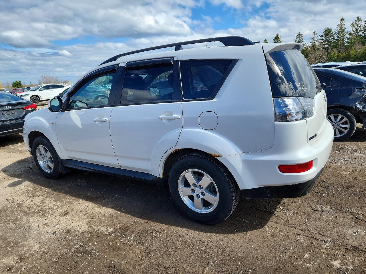 2010 Mitsubishi Outlander VIN JA4AT2AW7AZ602055 photo 2