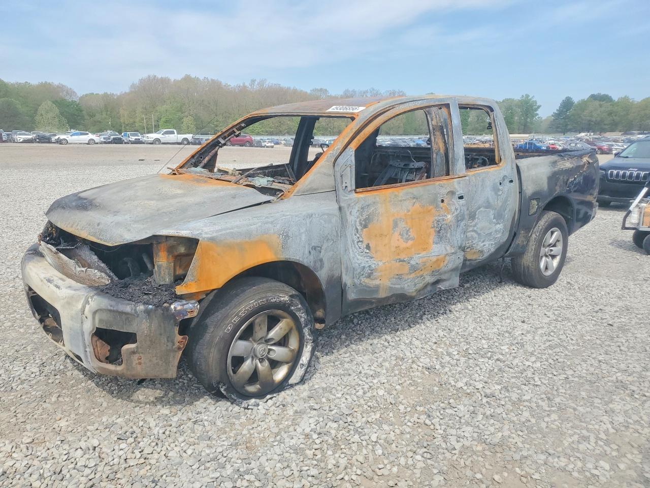 2012 Nissan TITAN VIN 1N6AA0EK4CN306571 photo 1