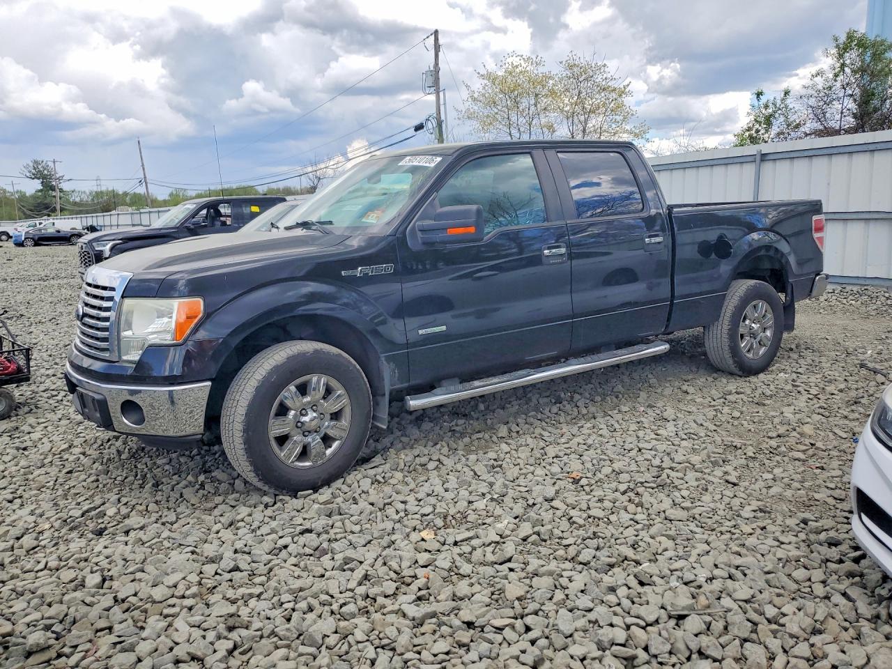 2011 Ford F150 VIN 1FTFW1ET1BKE12842 photo 1