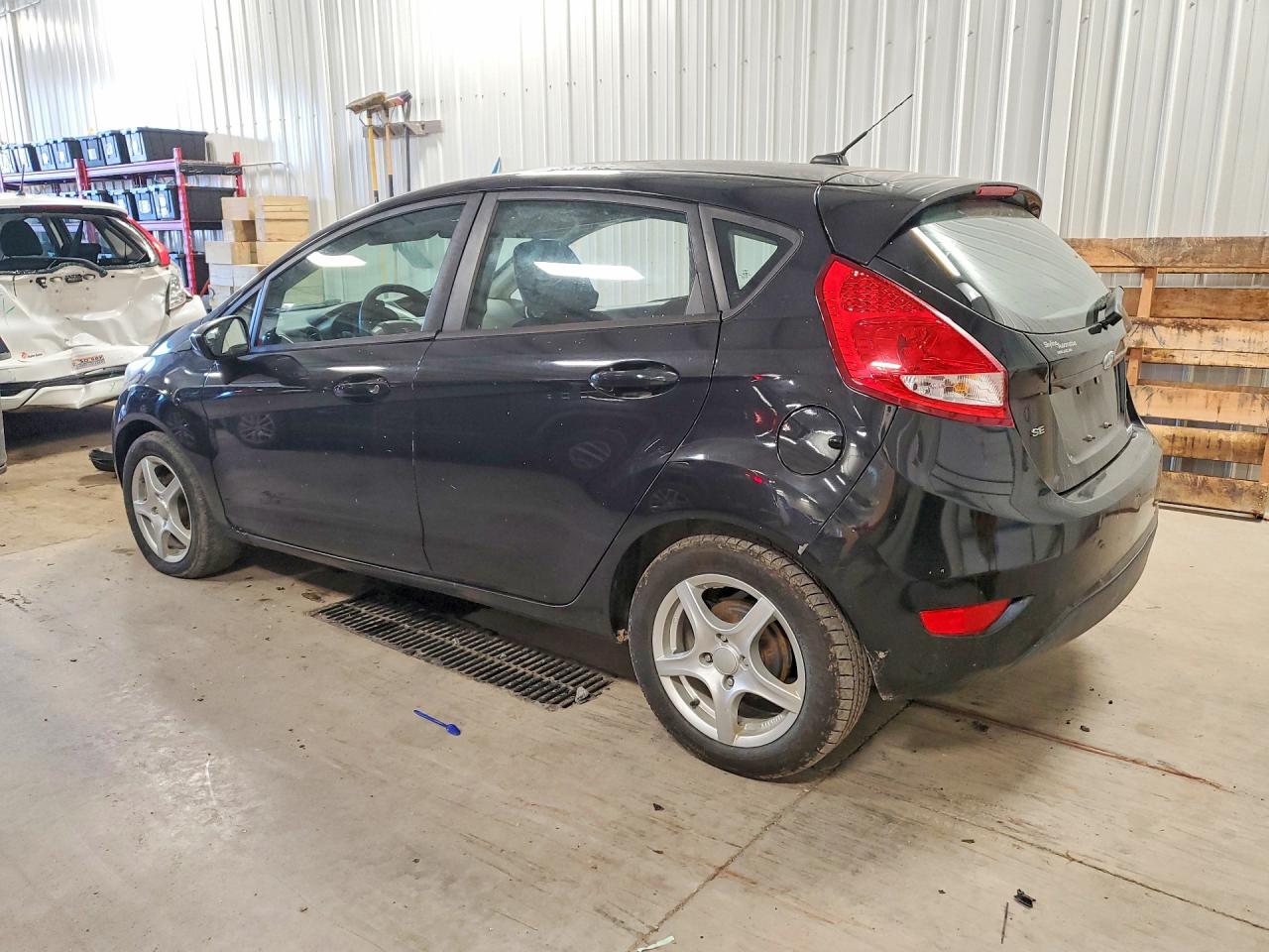 2011 Ford Fiesta VIN 3FADP4EJ1BM129795 photo 2