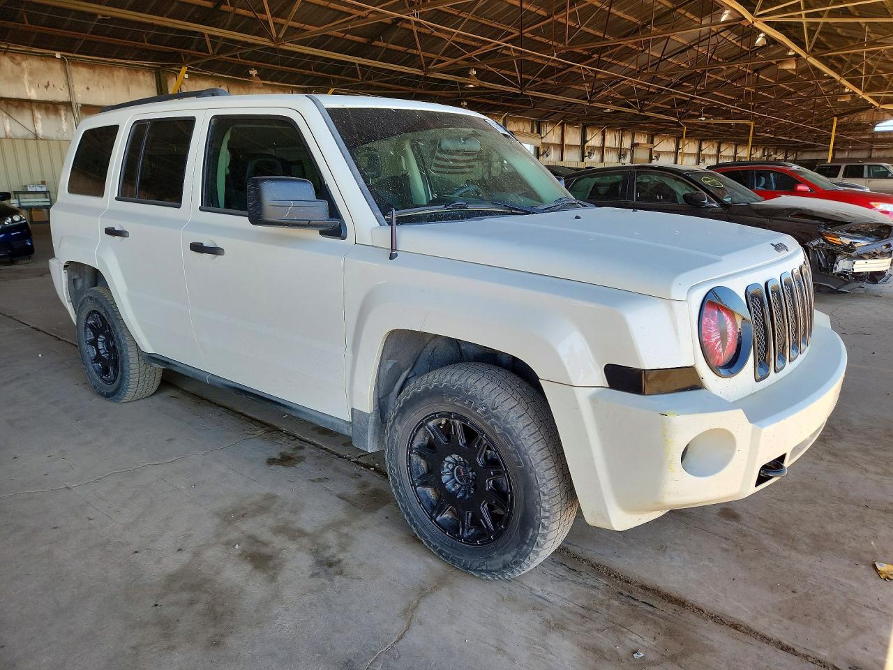 2009 Jeep Patriot VIN 1J4FF28B69D249591 photo 4
