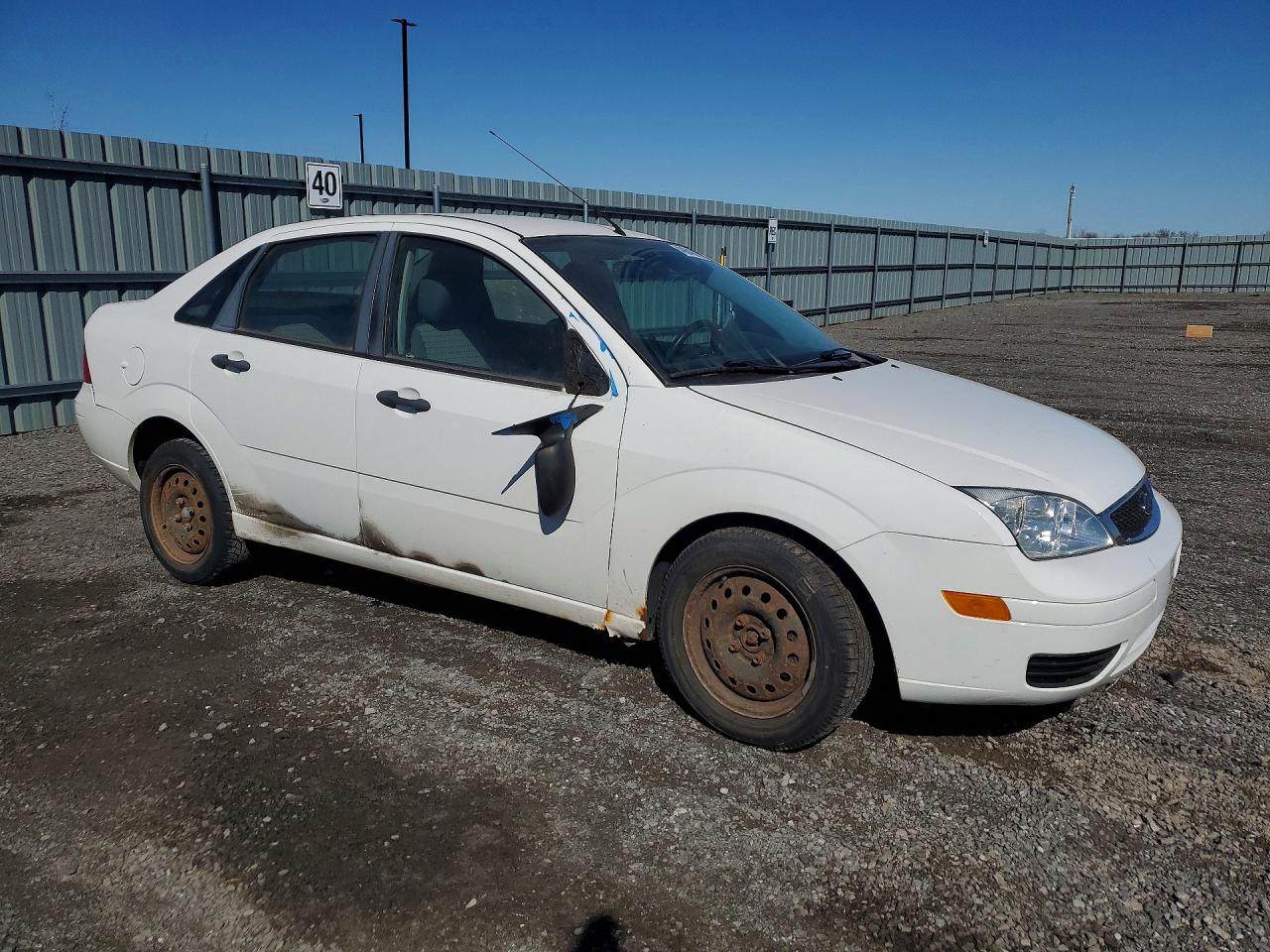 2007 Ford Focus VIN 1FAFP34N27W354435 photo 4