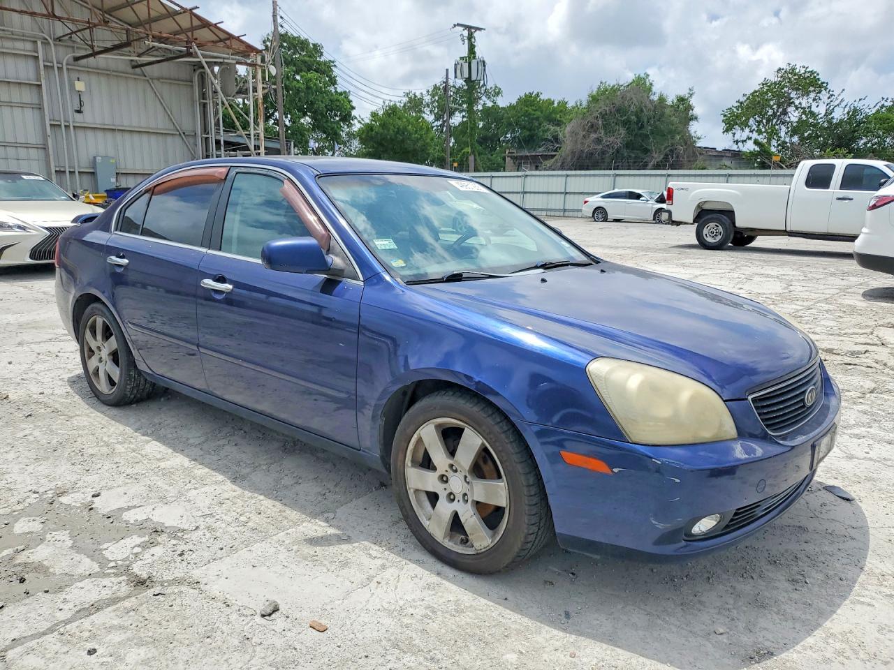 2007 Kia Optima VIN KNAGE124375126093 photo 4
