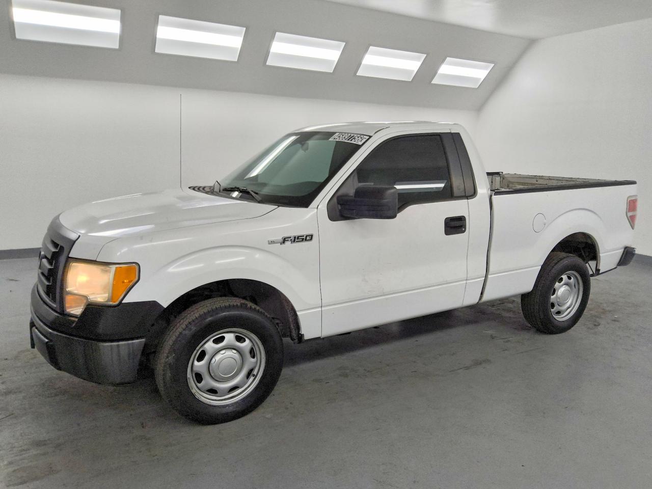 2011 Ford F150 VIN 1FTMF1CM1BKD44609 photo 1