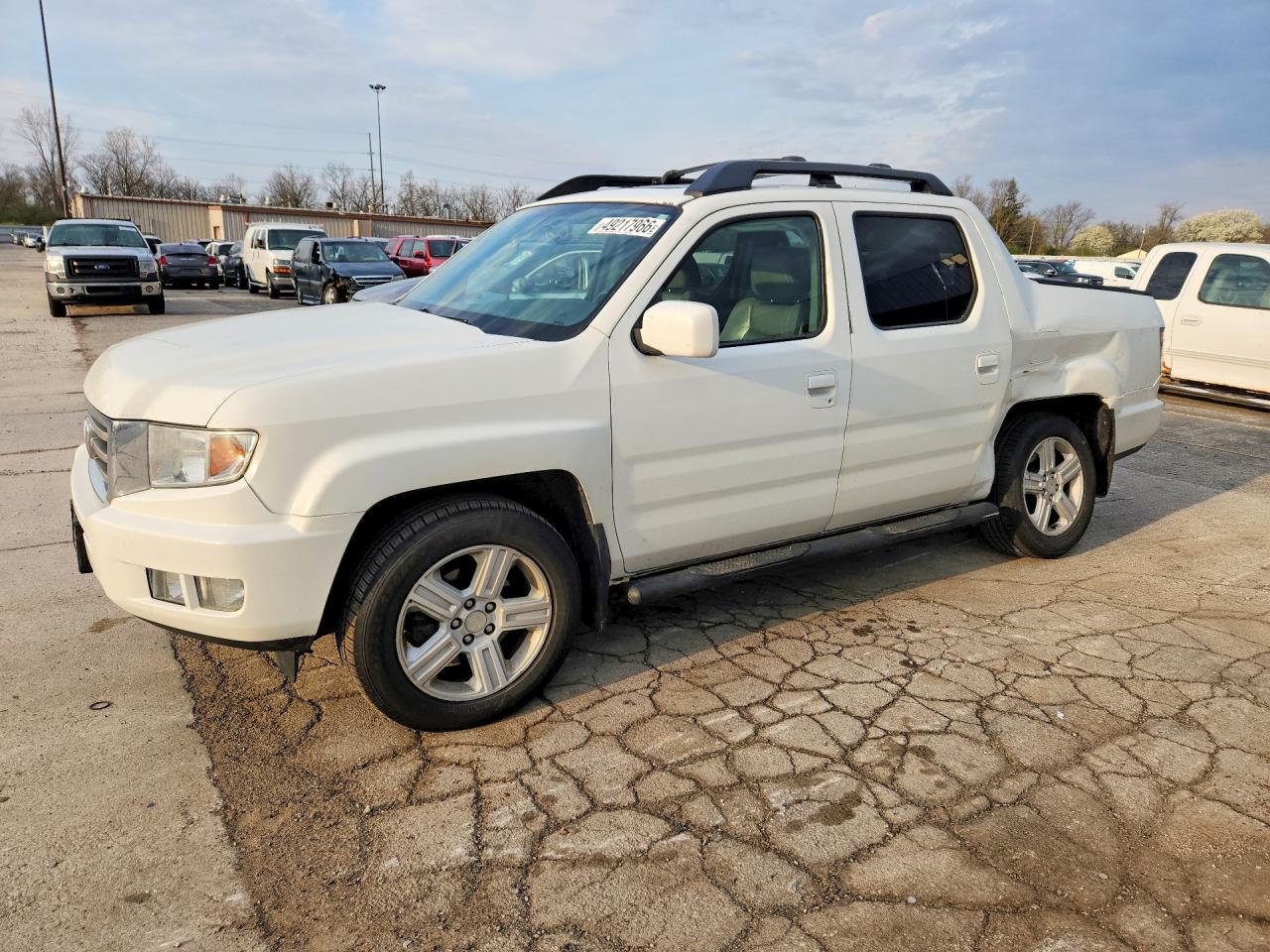 2014 Honda Ridgeline VIN 5FPYK1F51EB004354 photo 1