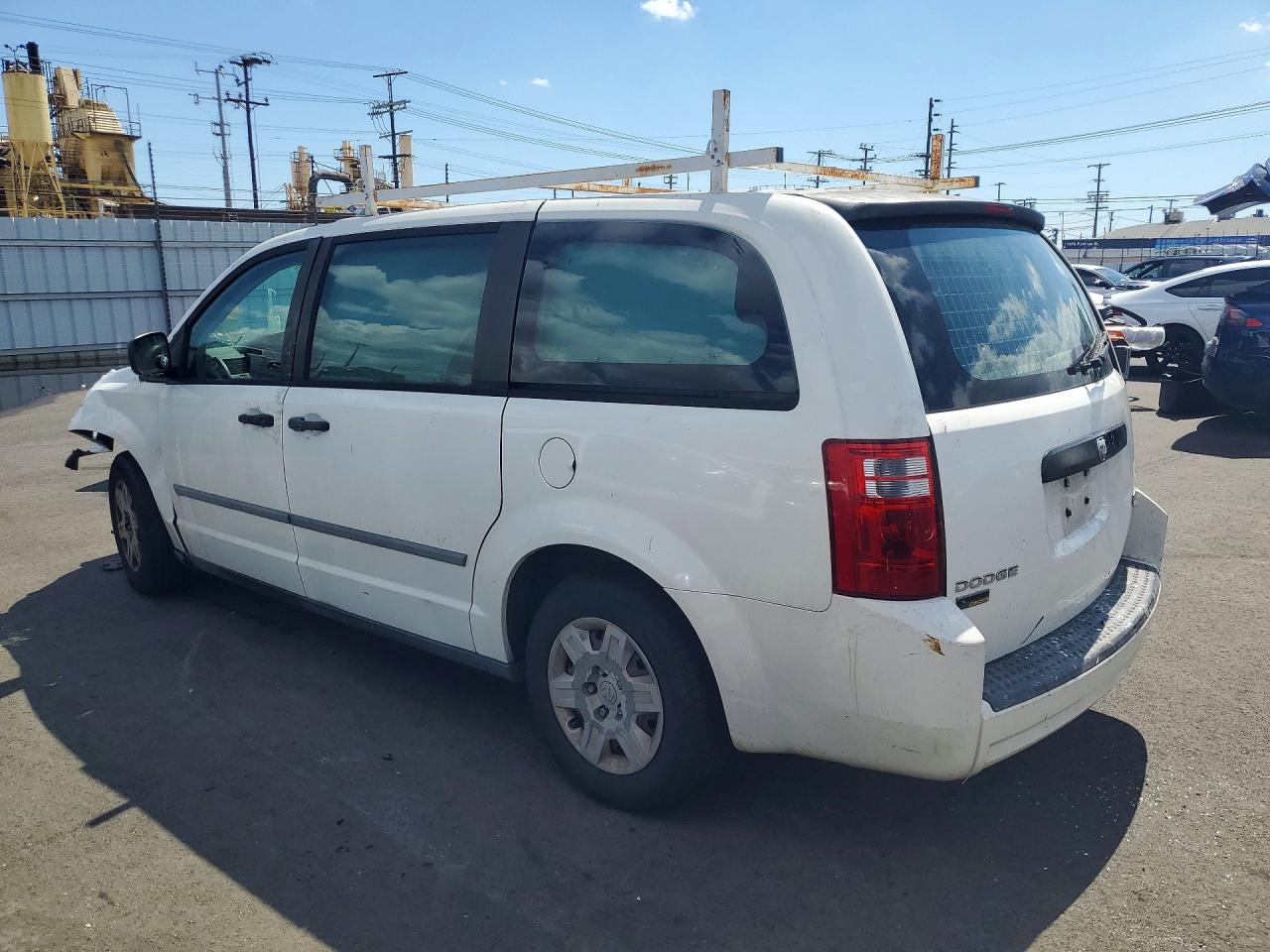 2010 Dodge Grand cara VIN 2D4CN1AE7AR497038 photo 2