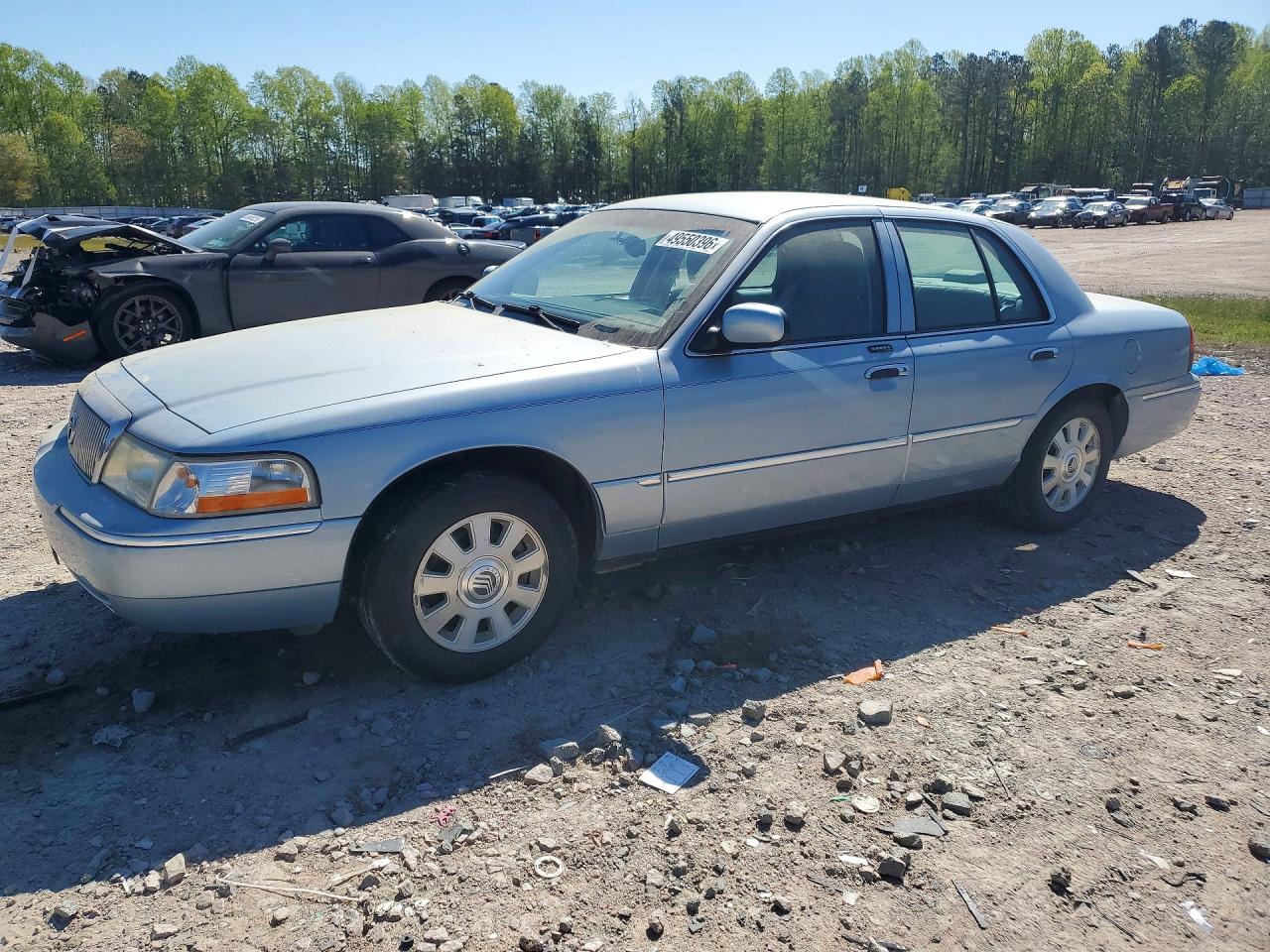 2004 Mercury Grmarquis VIN 2MEFM75W14X609415 photo 1