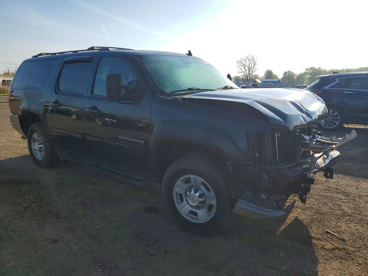 2011 Chevrolet Suburban VIN 1GNWKLEG6BR122928 photo 4