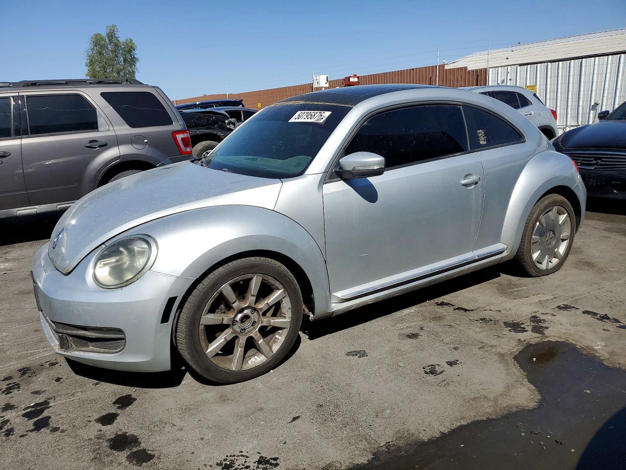 2013 Volkswagen Beetle VIN 3VWJP7AT0DM604486 photo 1