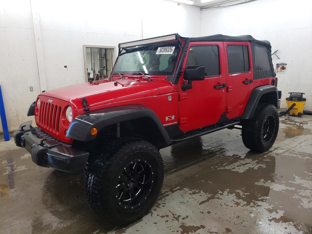 2009 Jeep Wrangler / VIN 1J4GA39179L728851 photo 1