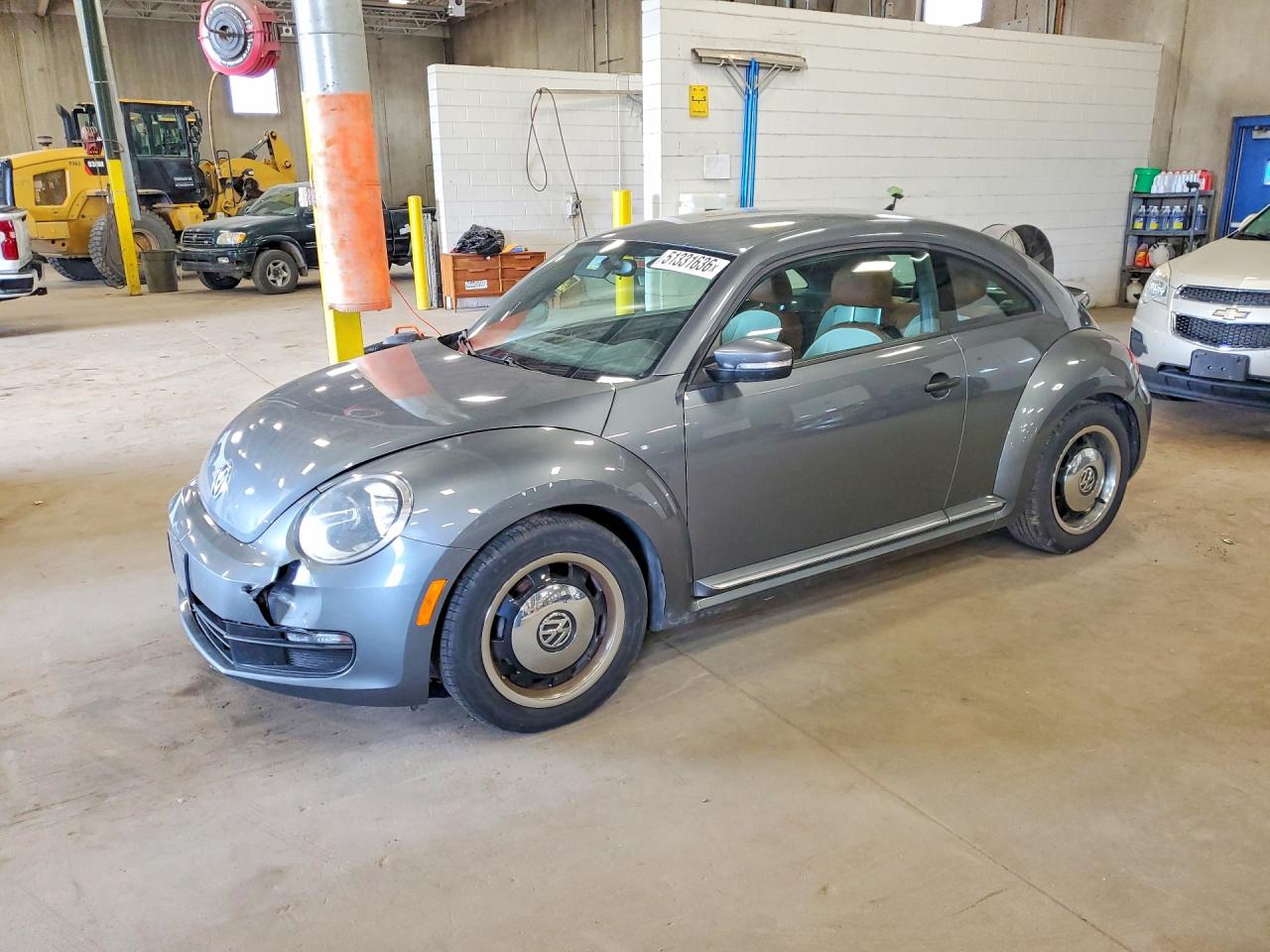 2016 Volkswagen Beetle VIN 3VWF17AT5GM637625 photo 1