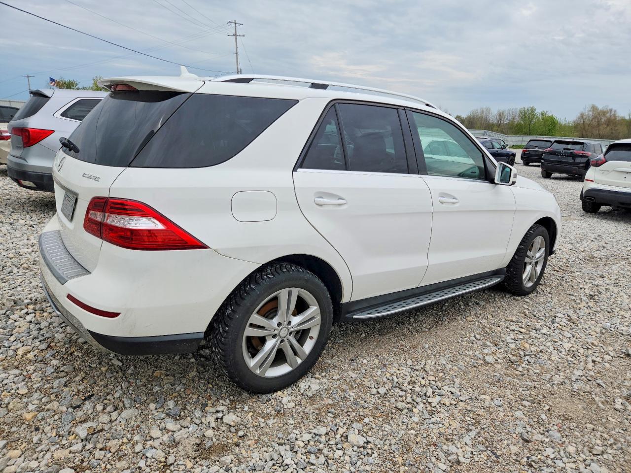 2015 Mercedes-Benz M-class VIN 4JGDA0EB8FA515450 photo 3