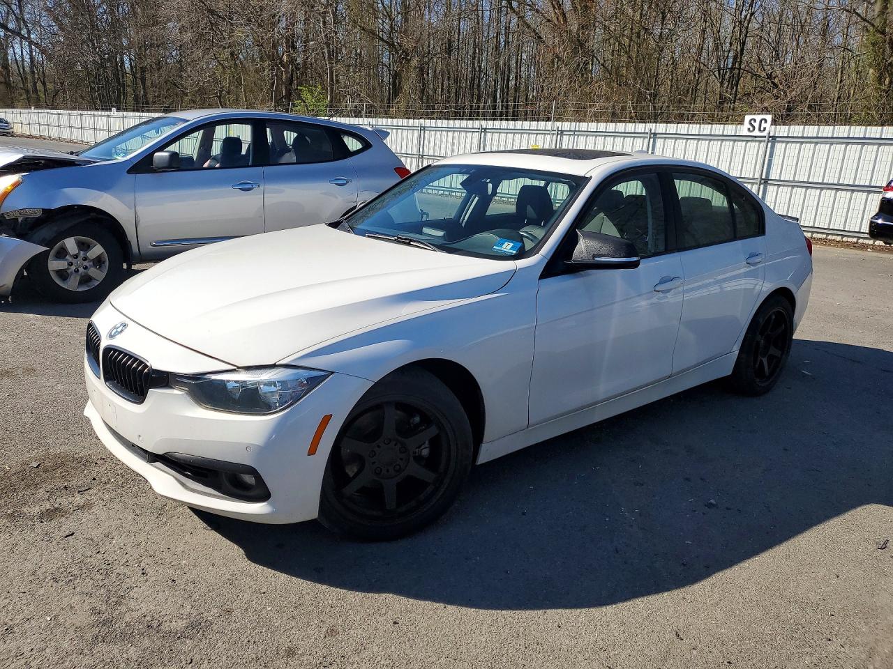 2016 BMW 3 series VIN WBA8E5G58GNT40221 photo 1