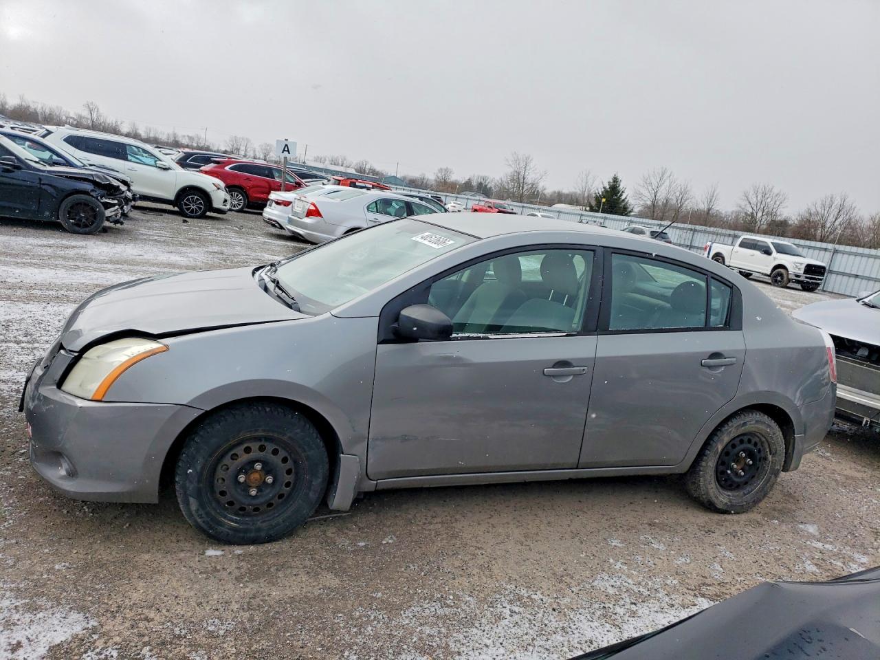 2010 Niss Sentra VIN 3N1AB6AP4AL688749 photo 1