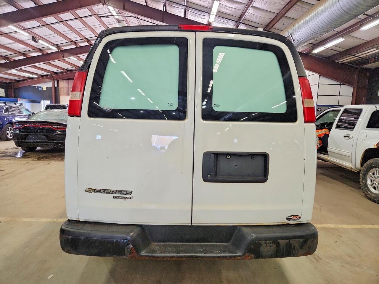 2014 CHEV Express VIN 1GCWGFCA4E1123119 photo 6