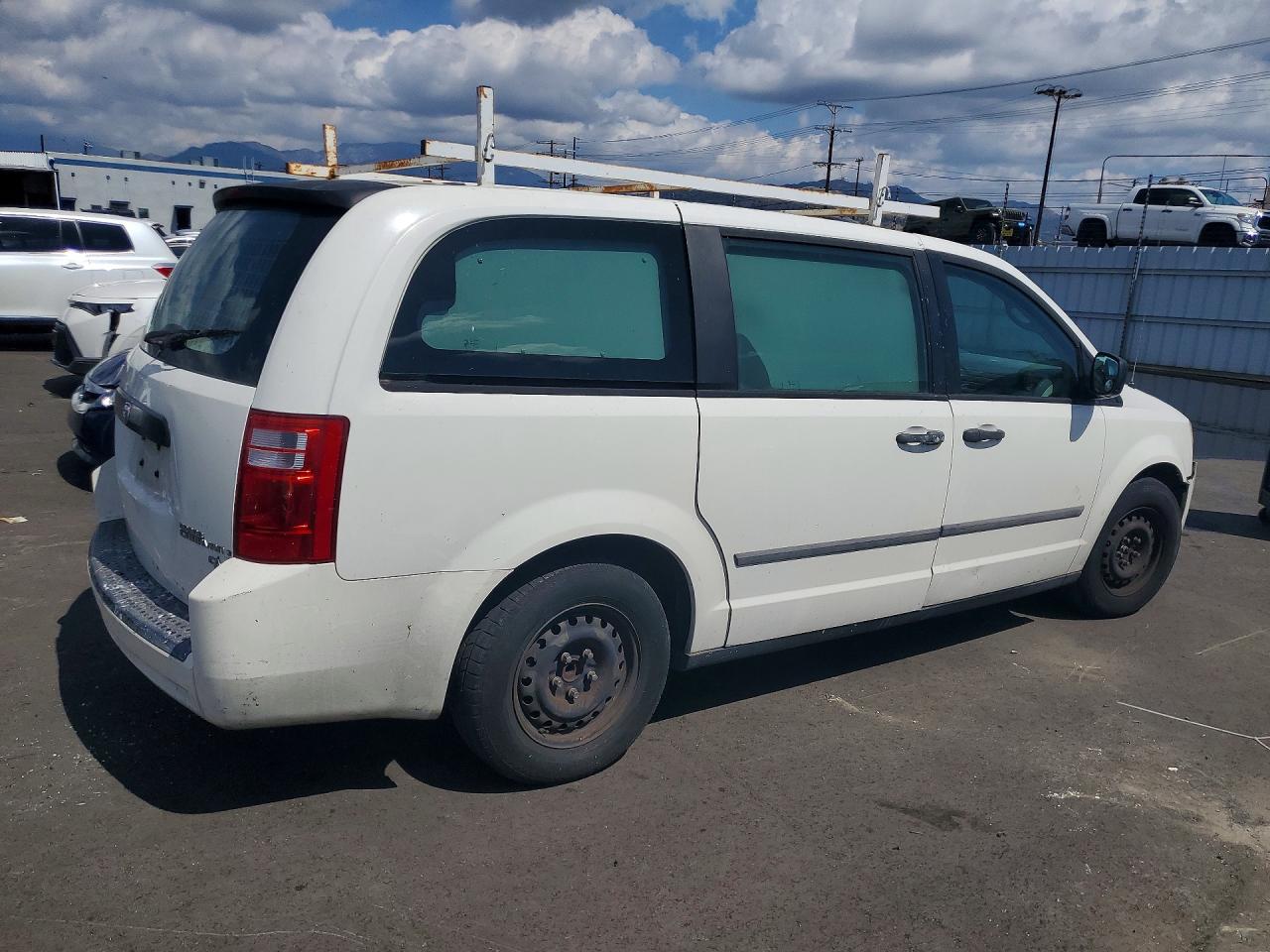2010 Dodge Grand cara VIN 2D4CN1AE7AR497038 photo 3