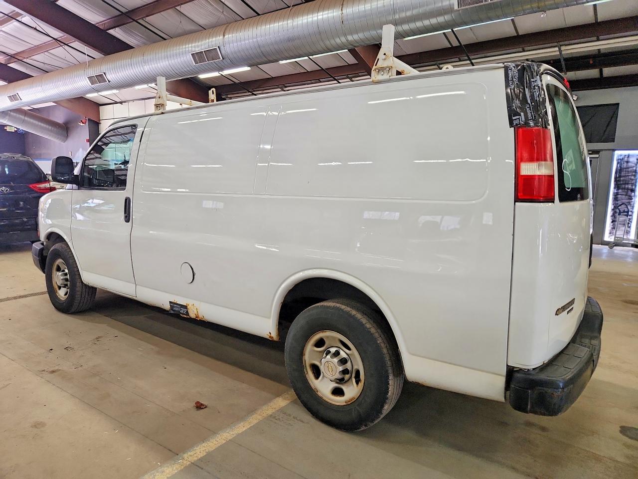 2014 CHEV Express VIN 1GCWGFCA4E1123119 photo 2