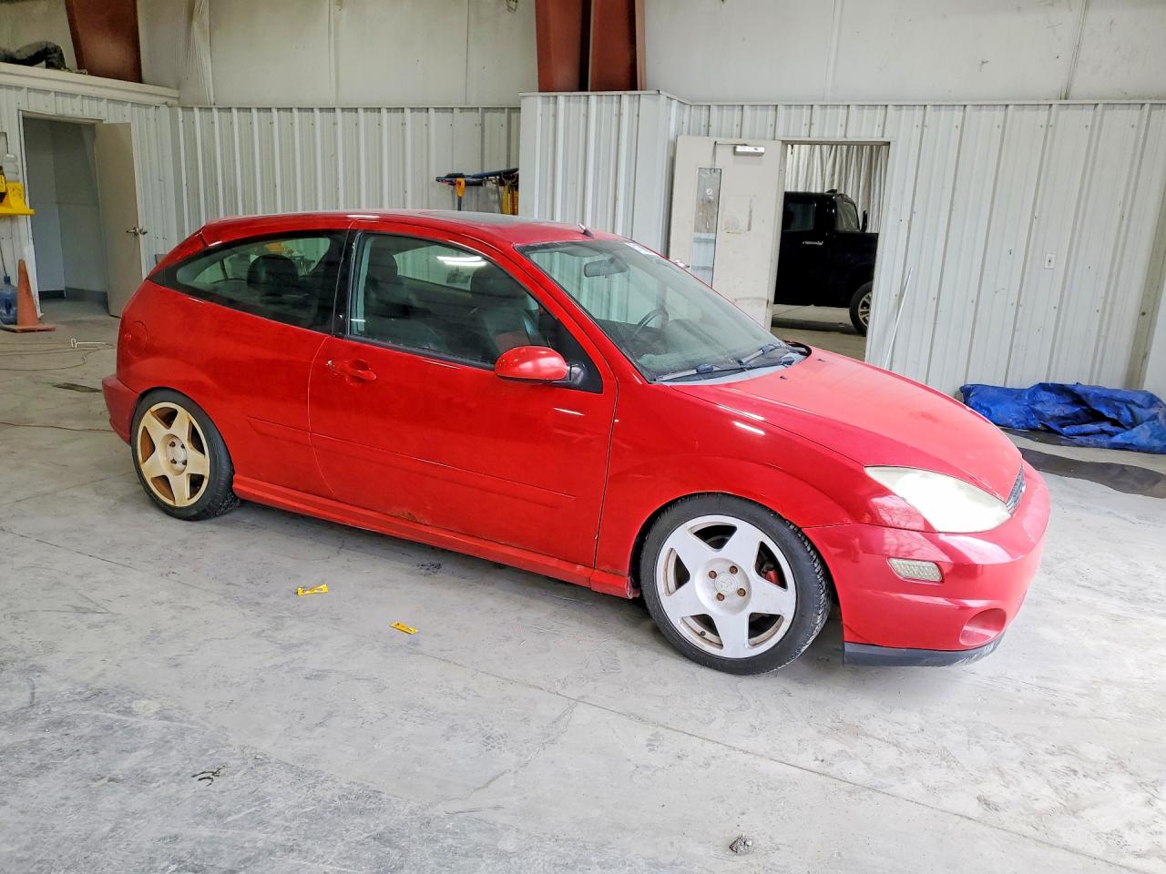 2003 Ford Focus VIN 3FAHP39563R174650 photo 4
