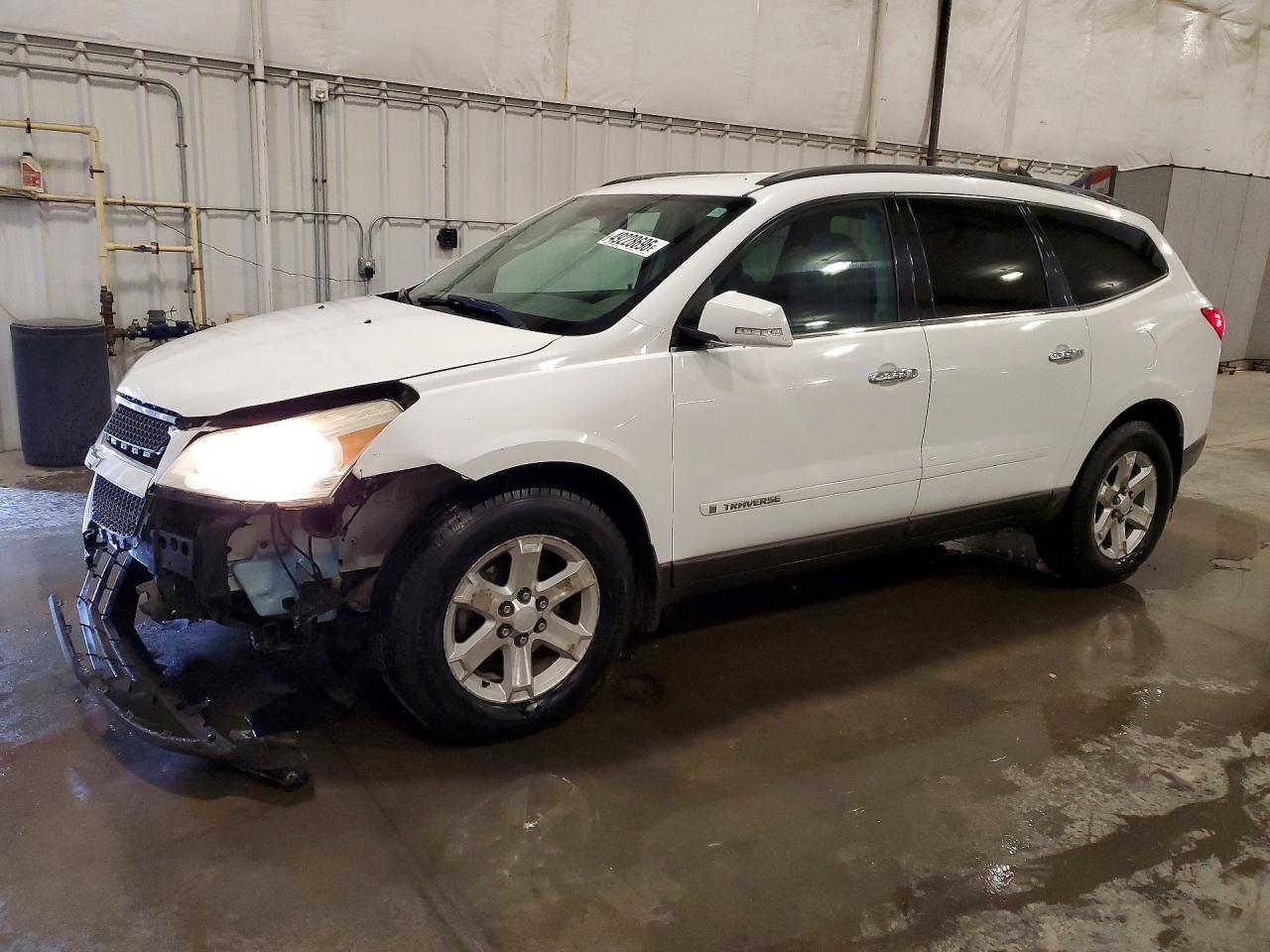 2009 Chevrolet Traverse VIN 1GNEV23D59S151085 photo 1