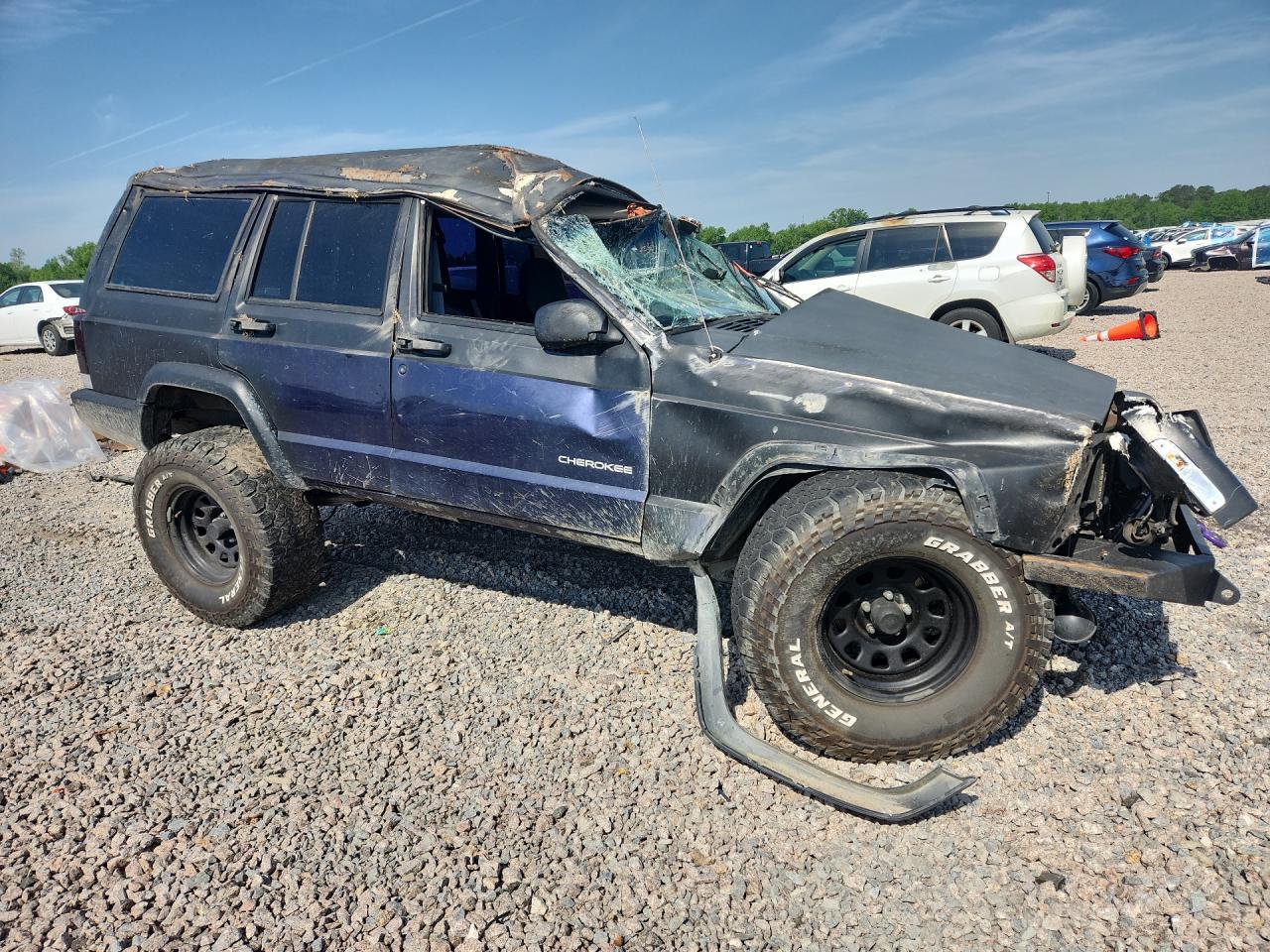 1999 Jeep Cherokee VIN 1J4FF28S4XL634392 photo 4