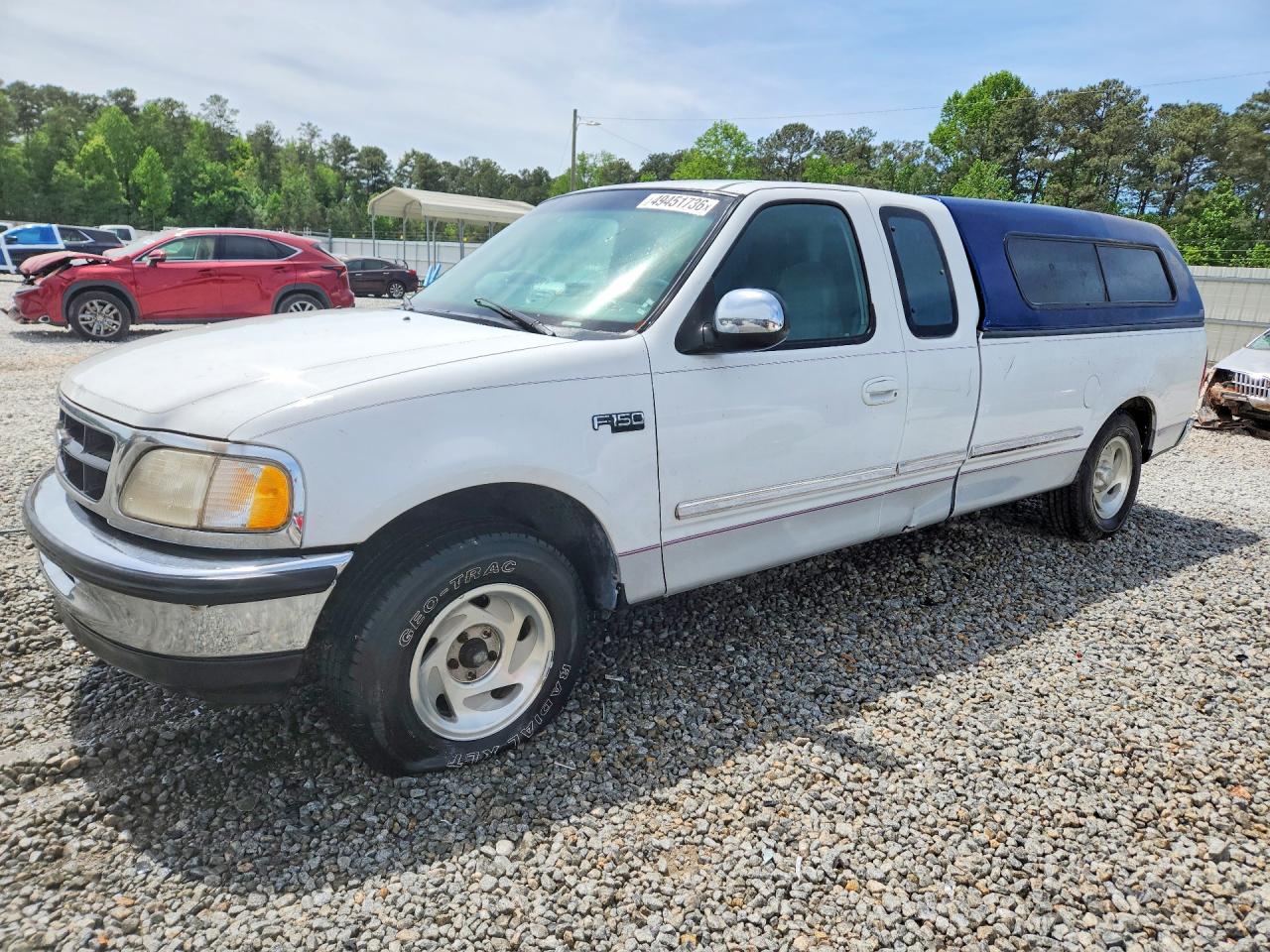 1997 Ford F150 VIN 1FTDX1764VNA58877 photo 1