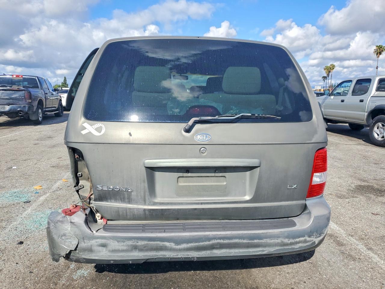 2004 Kia SEDONA VIN KNDUP131946582223 photo 6