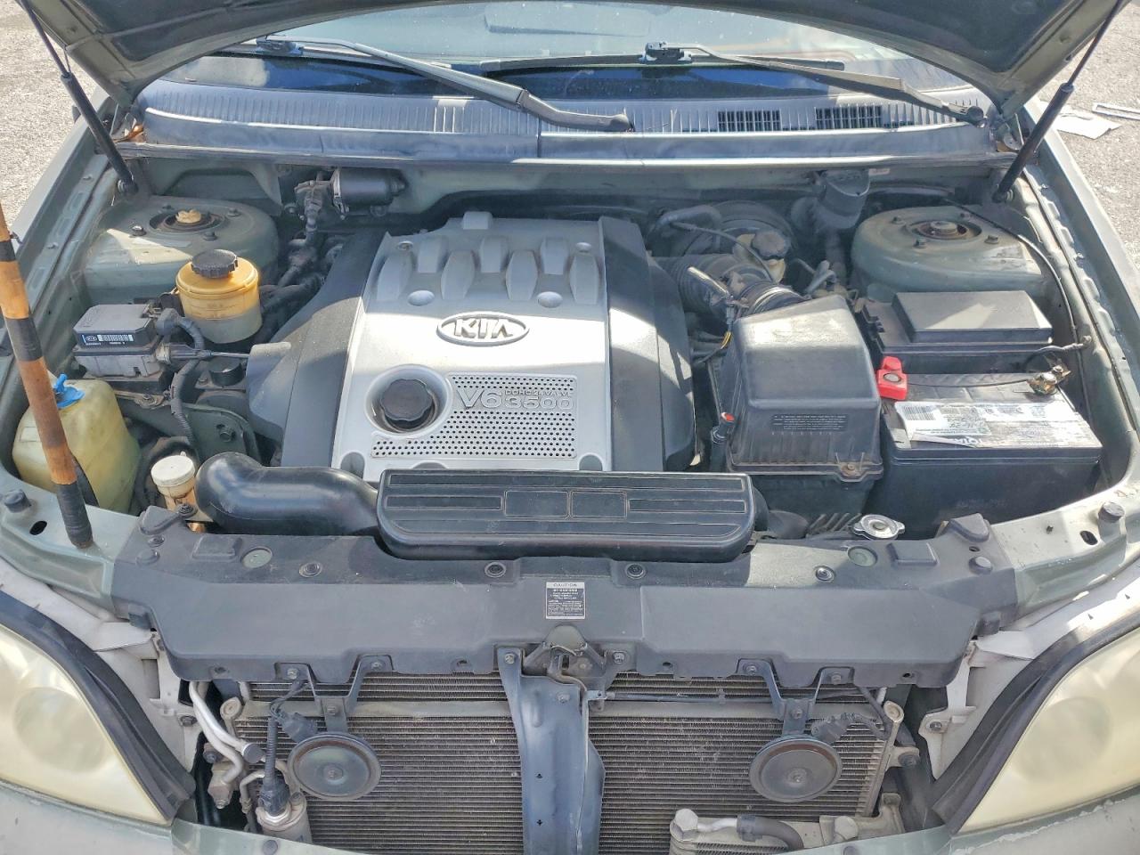 2004 Kia SEDONA VIN KNDUP131946582223 photo 12